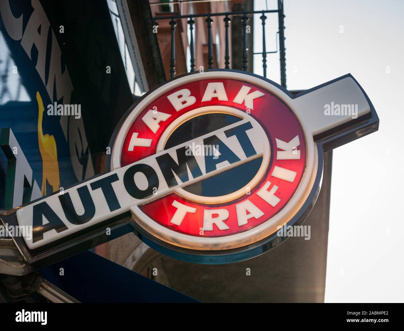 VIENNA, AUSTRIA - NOVEMBER 6, 2019: Austrian tobacconist sign, also called tabaktrafik automat, in the city center of Vienna. It is a typical design t Stock Photo