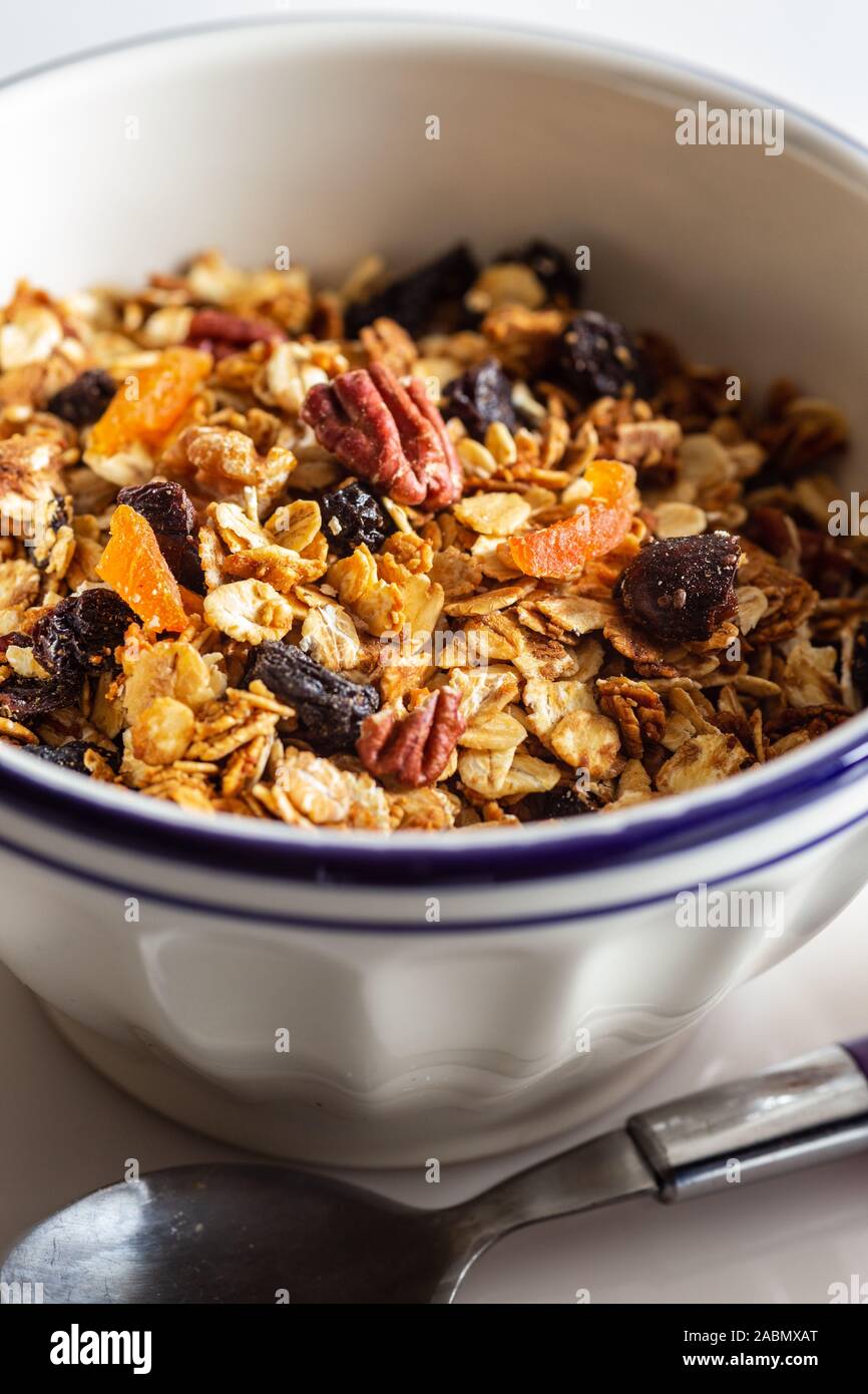 Fruit Granola Cereal Breakfast Bowl with Milk Stock Photo