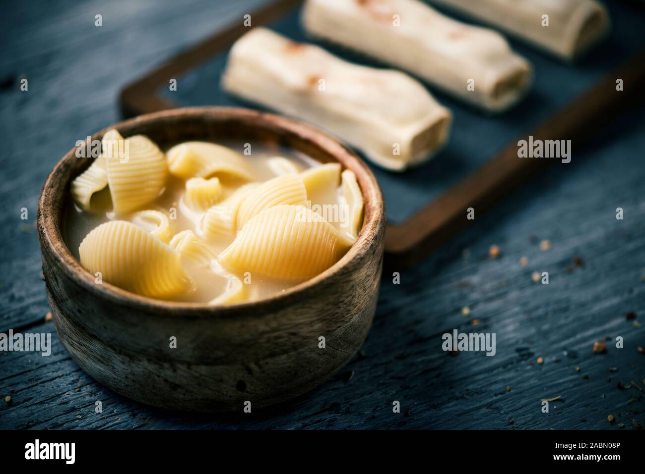 sopa de galets o escudella de Nadal and canelons, soup with galets pasta  and meat stuffed cannelloni, typically eaten on Christmas in Catalonia,  Spain Stock Photo - Alamy