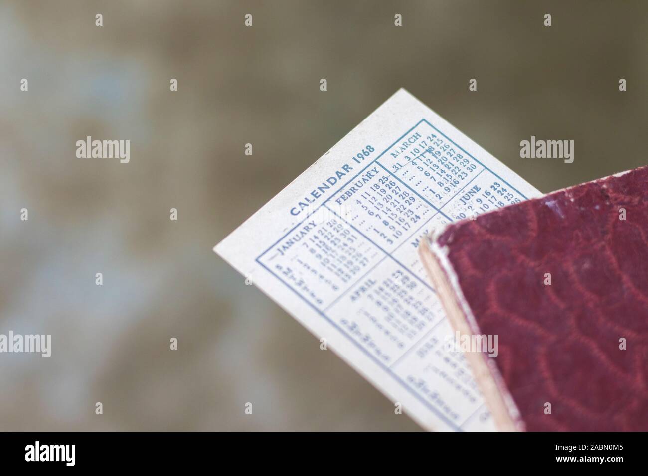 1968 pocket calendar used as bookmark for a diary Stock Photo - Alamy