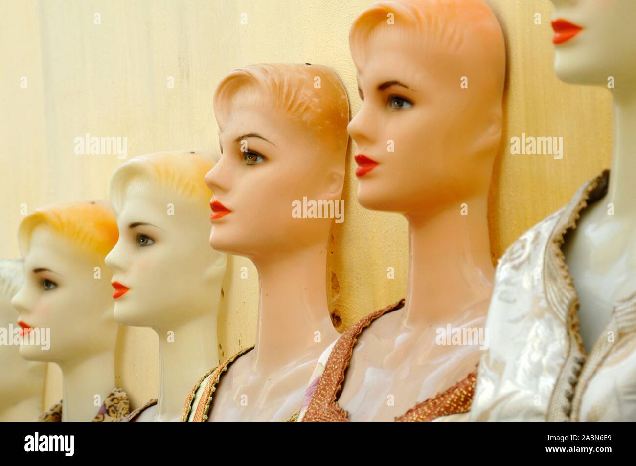 Line of Rubber Dressmakers Dummies or Mannequins in Women's Clothes Shop Fes or Fez Morocco Stock Photo