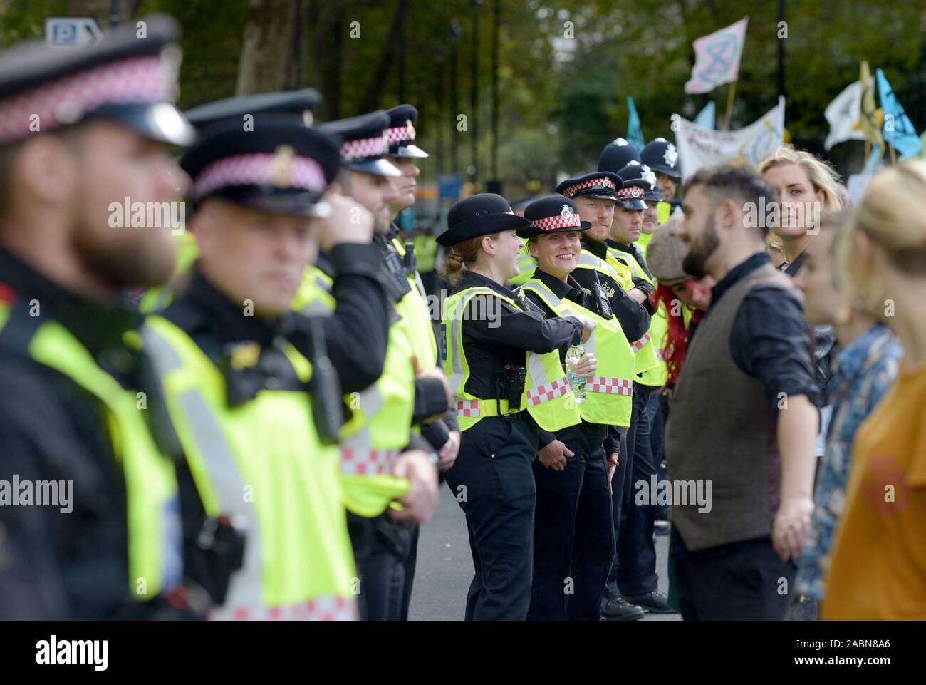 London, England, UK. Policing an Extinction Rebellion process in Westminster, October 2019. Stock Photo