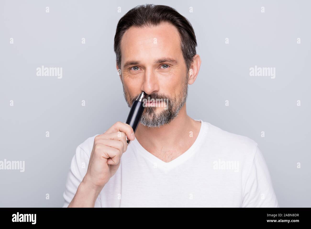 Photo Of Handsome Mature Man Guy Metrosexual Hold Electric Trimmer