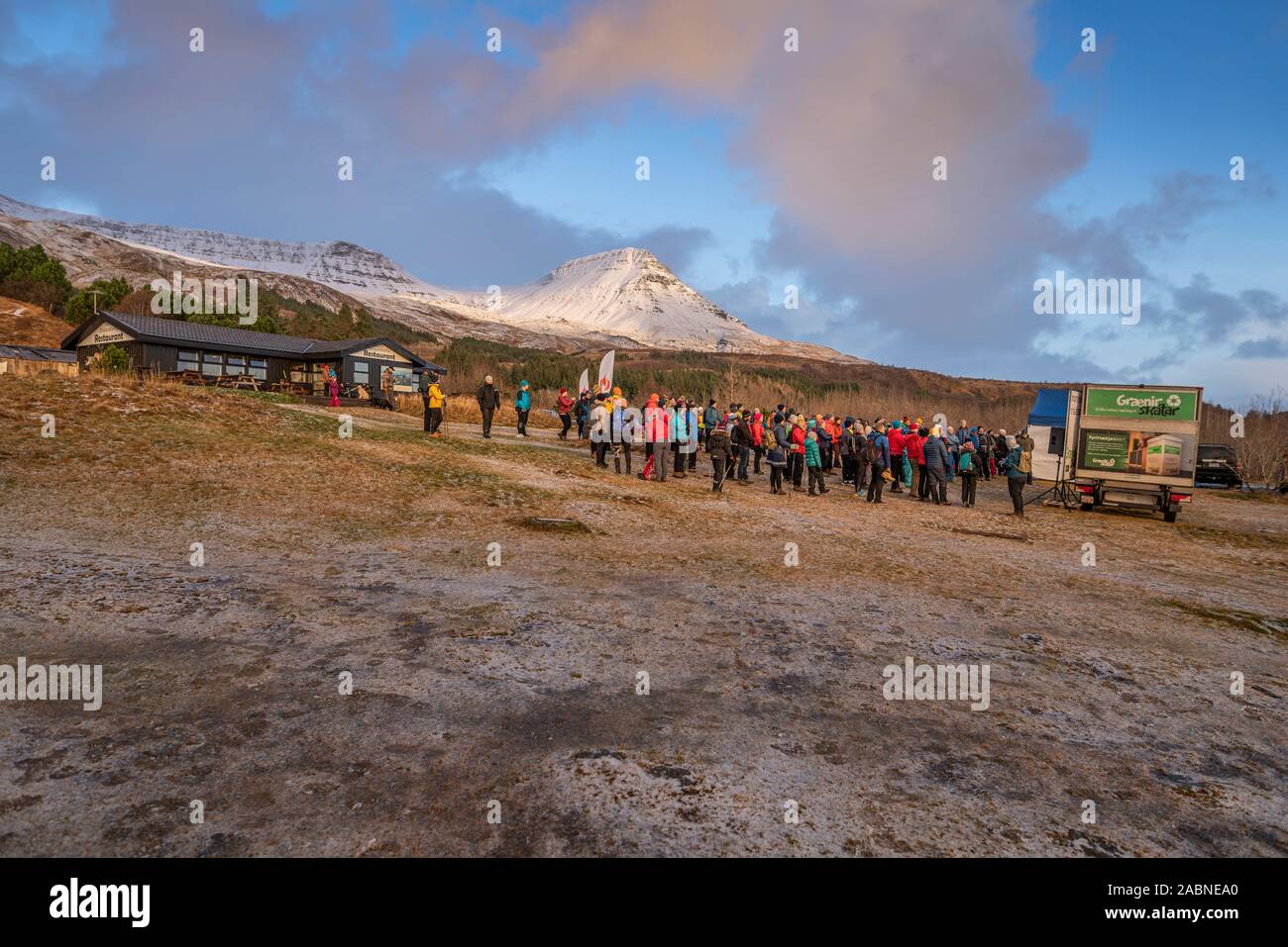 People gathering prior to climbing Mt Esja, Reykjavik, Iceland Stock Photo