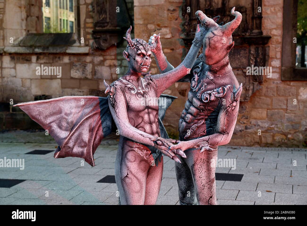 Hannover, Deutschland. 28th Nov, 2019. GEEK ART - Bodypainting and Transformaking: Gargoyle photoshooting with Enrico Lein and Marlena Wieland at the Nikolai graveyard in Hannover on November 28, 2019 - A project by the photographer Tschiponnique Skupin and the bodypainter Enrico Lein Credit: Geisler-Fotopress GmbH/Alamy Live News Stock Photo