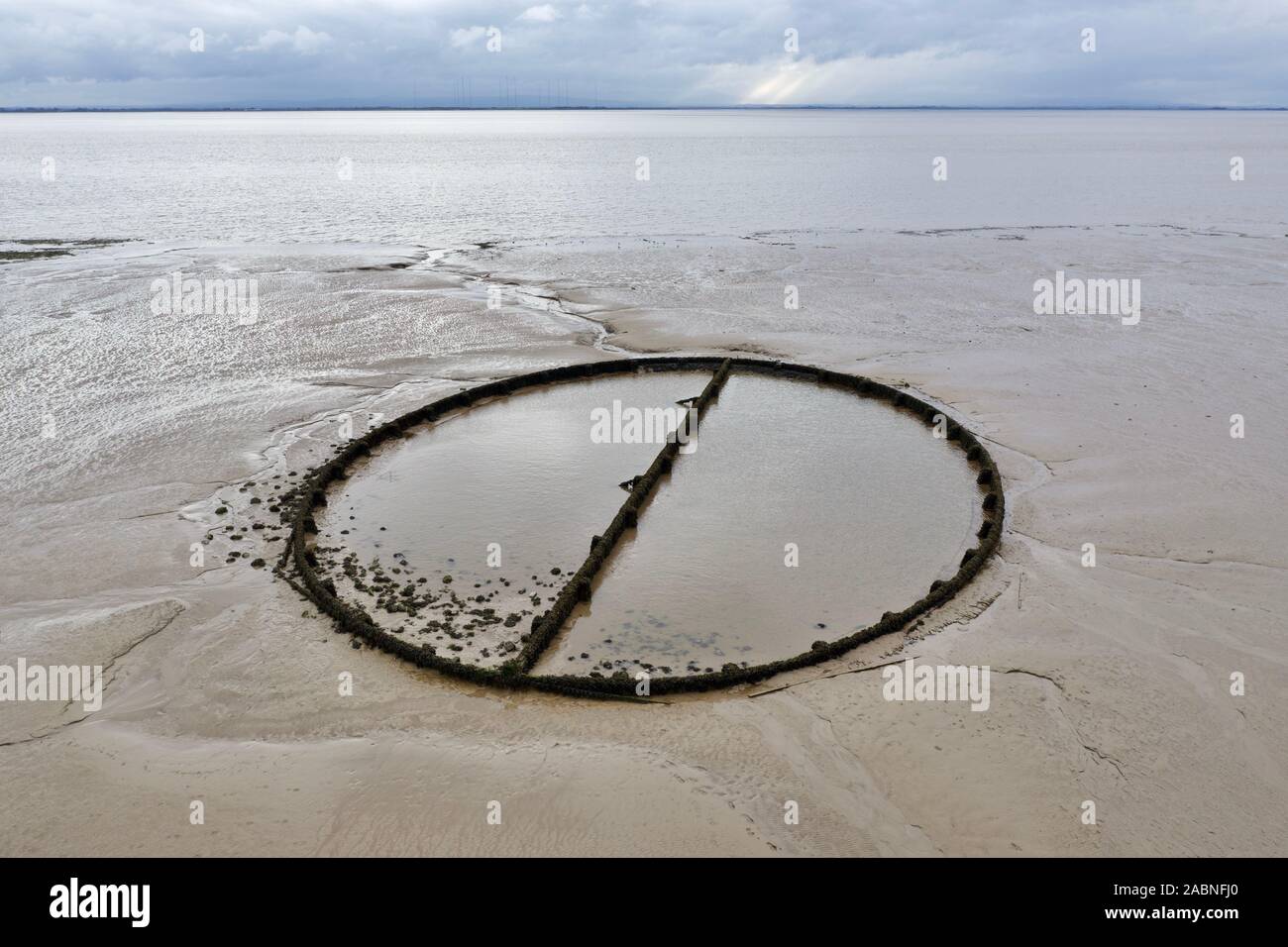 An aerial view of the famous Victorian tidal swimming pool at Powfoot, Dumfries and Galloway in the Solway Firth, UK at low tide. Stock Photo
