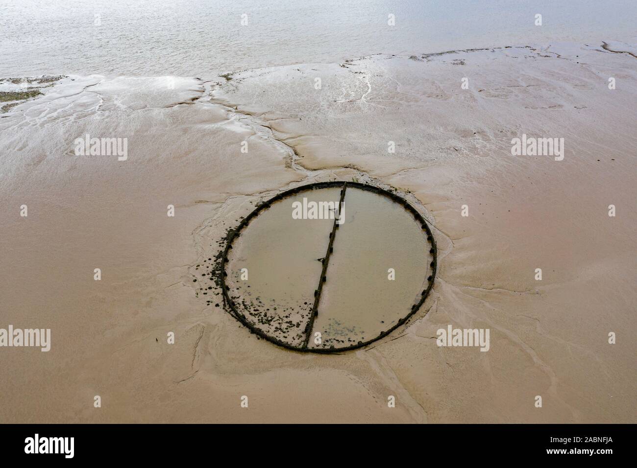 An aerial view of the famous Victorian tidal swimming pool at Powfoot, Dumfries and Galloway in the Solway Firth, UK at low tide. Stock Photo