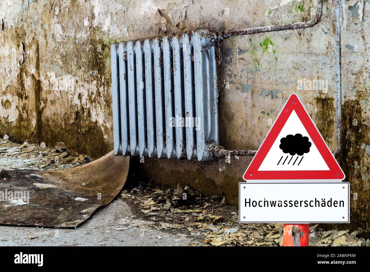 Attention sign flood damage in german Stock Photo