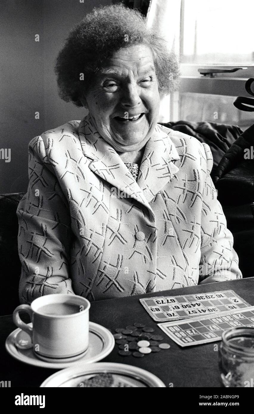 Portrait of an elderly woman playing bingo at Edwards Lane Community Centre, Nottingham, UK, 1989 Stock Photo