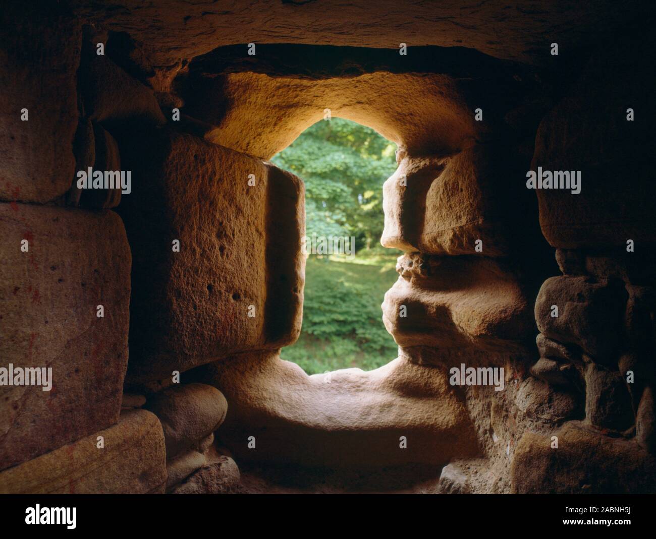 View S a small window lighting the internal stairs of the C13th D-shaped Welsh Tower in the upper ward of Ewloe Castle, Flintshire, Wales, UK. Stock Photo