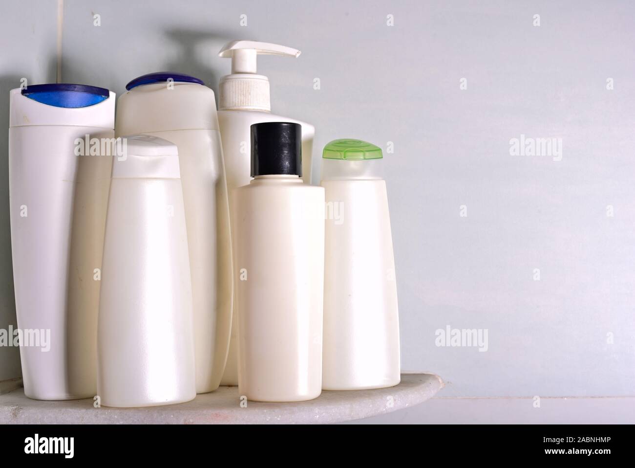 Set of skin care, shampoo and detergent bottles and containers in a