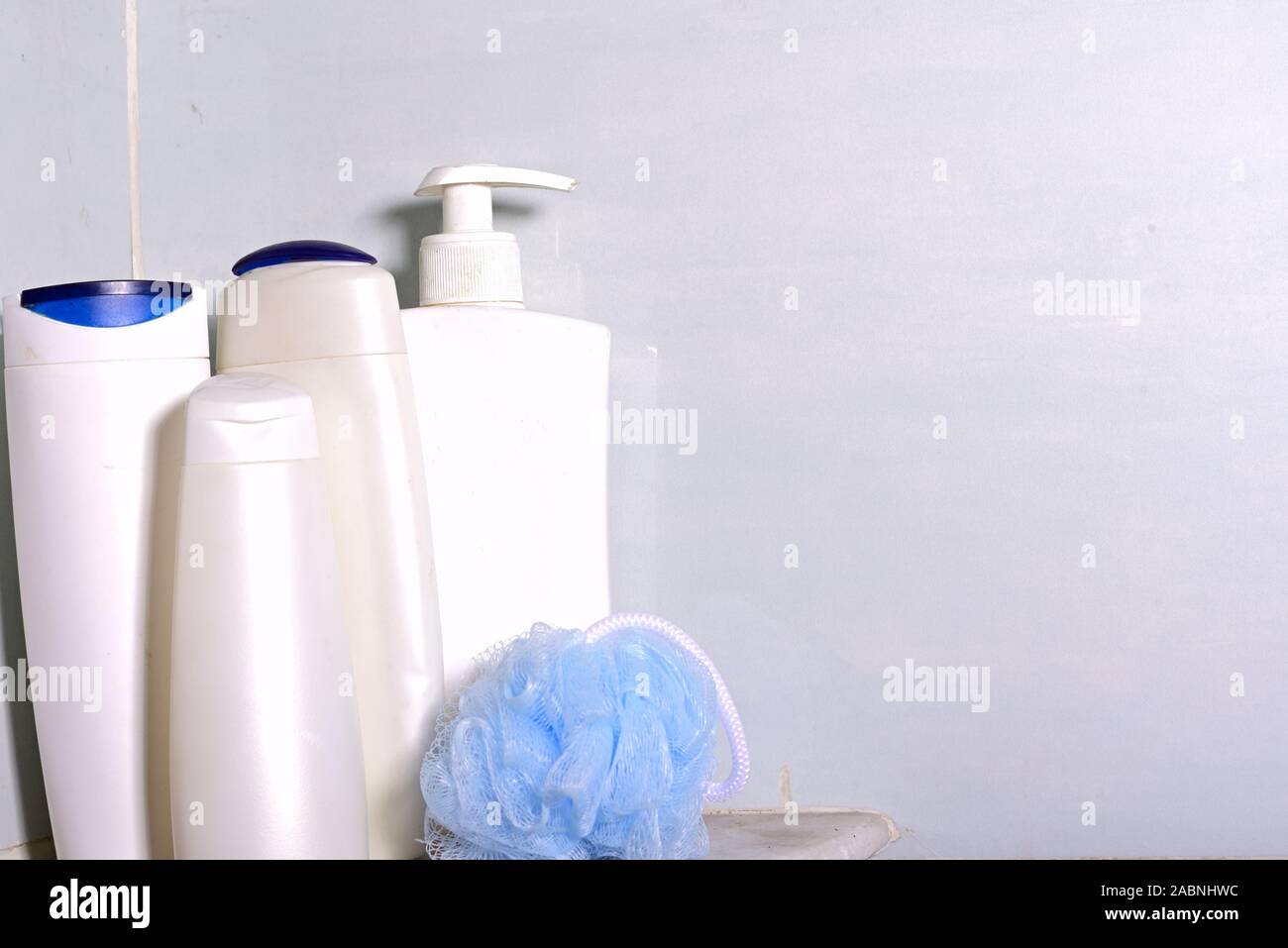 Set of skin care, shampoo and detergent bottles and containers in a