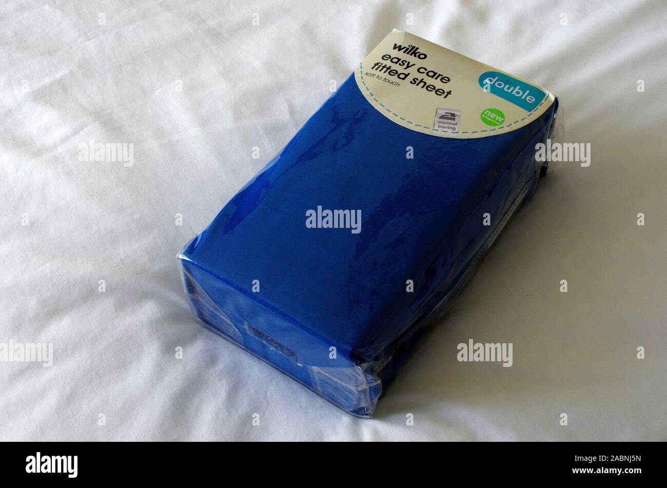 Wilko Easy Care Blue Cotton Fitted Double Sheet, UK Stock Photo