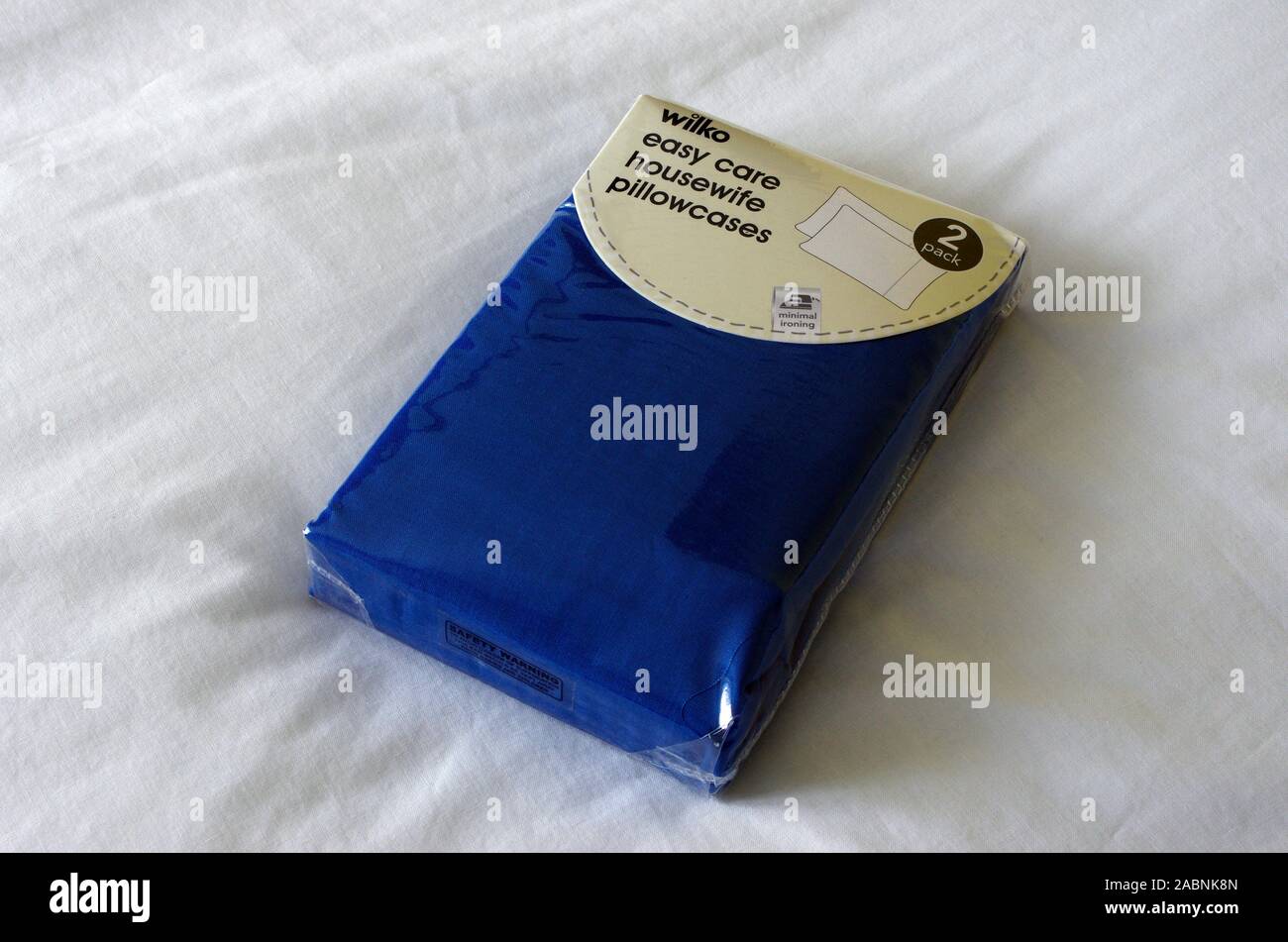 Wilko Easy Care Housewife Blue Cotton Pillowcases in Outer Packaging, UK Stock Photo