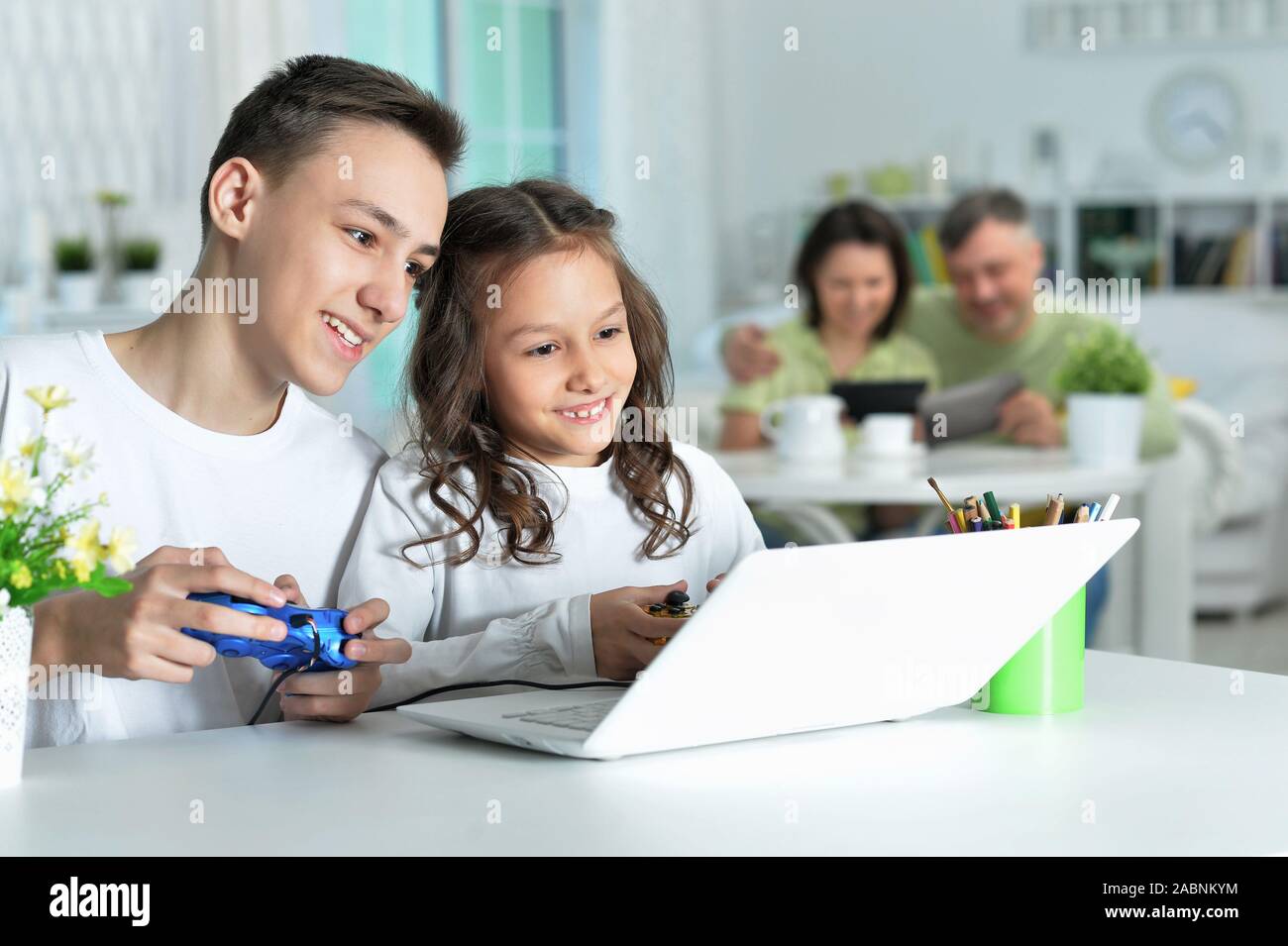 Happy teen boy playing game hi-res stock photography and images - Alamy