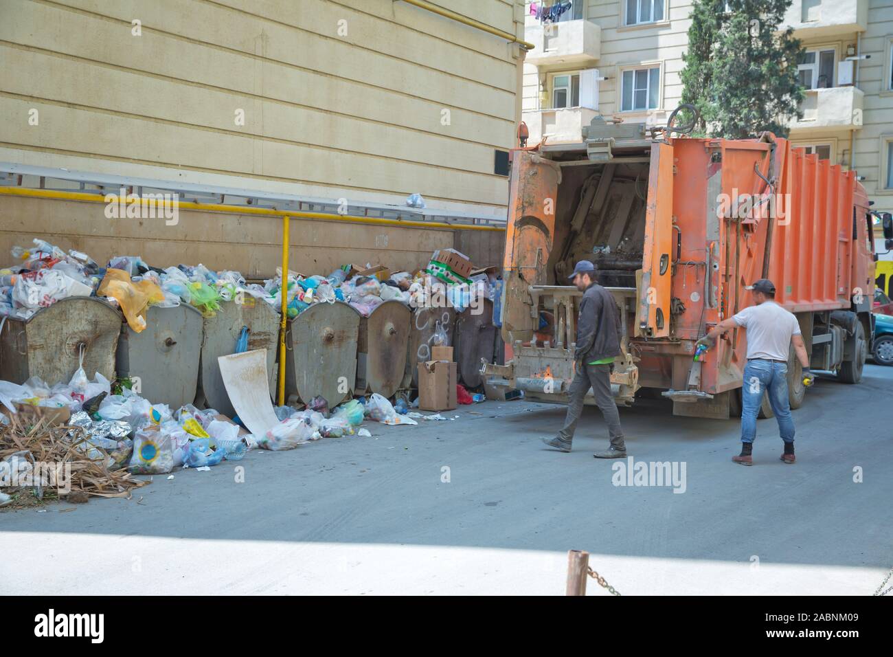Collection and transportation of household garbage by utility workers