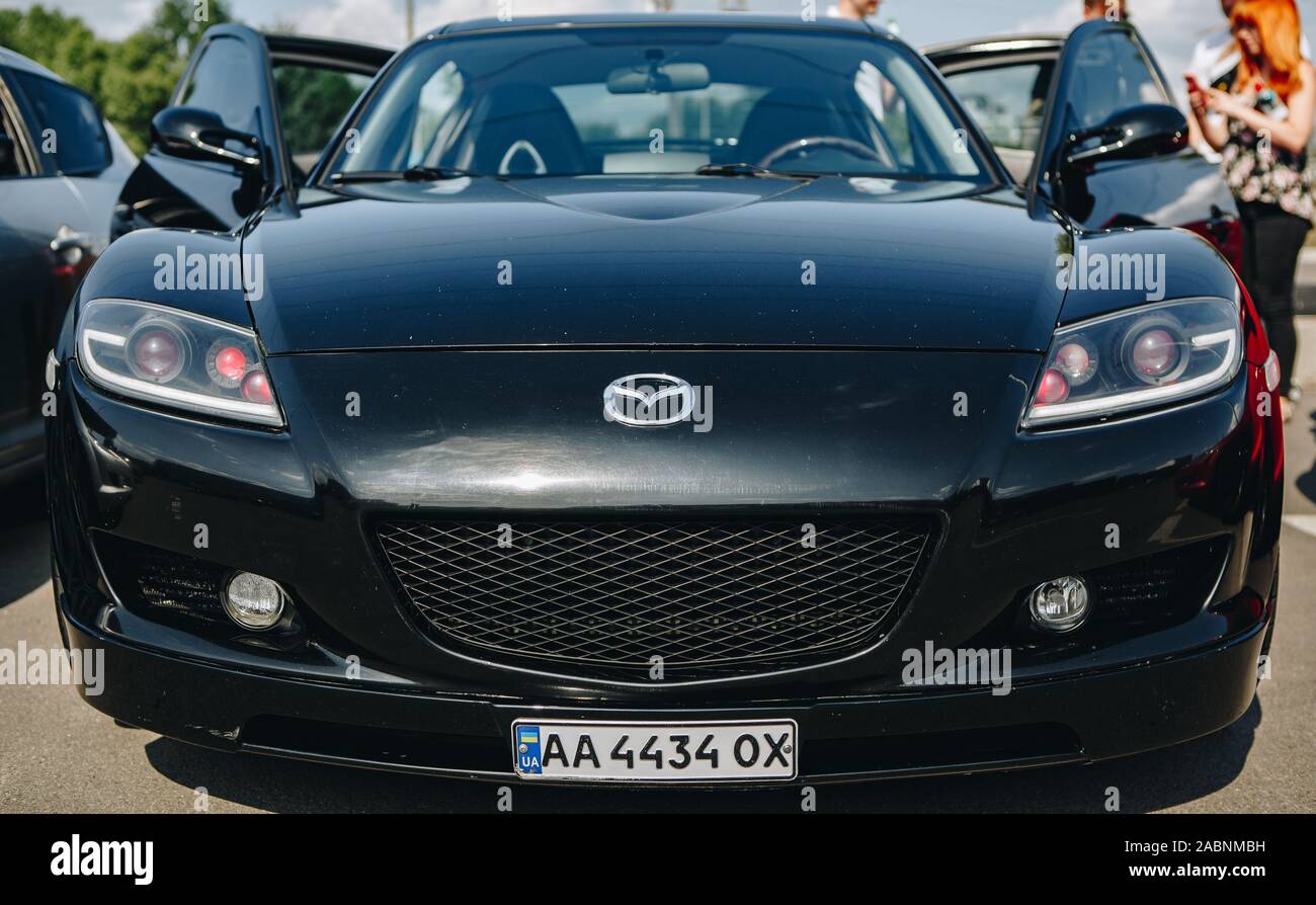 KYIV-28 JULY,2019: JDM car show outdoor.Tuned Japanese drift cars expo in summer.Modified Mazda RX 8 vehicle with high performance Wankel rotary engin Stock Photo