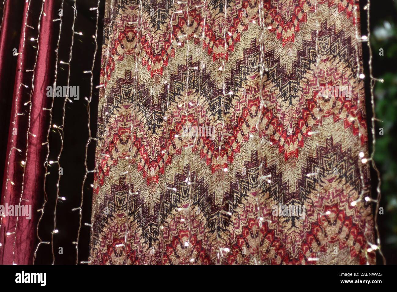print texture red with white oriental pattern on fabric. Stock Photo