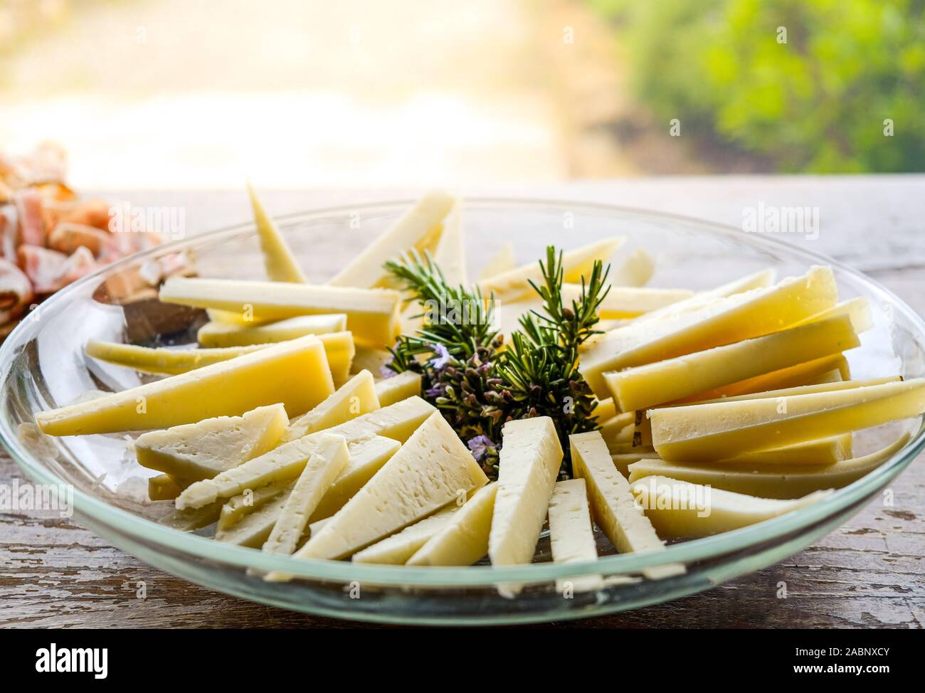 cheese wedges on a plate slices of pecorino Stock Photo