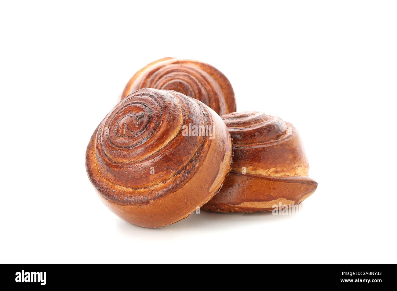 Tasty cinnamon roll isolated on white background Stock Photo - Alamy