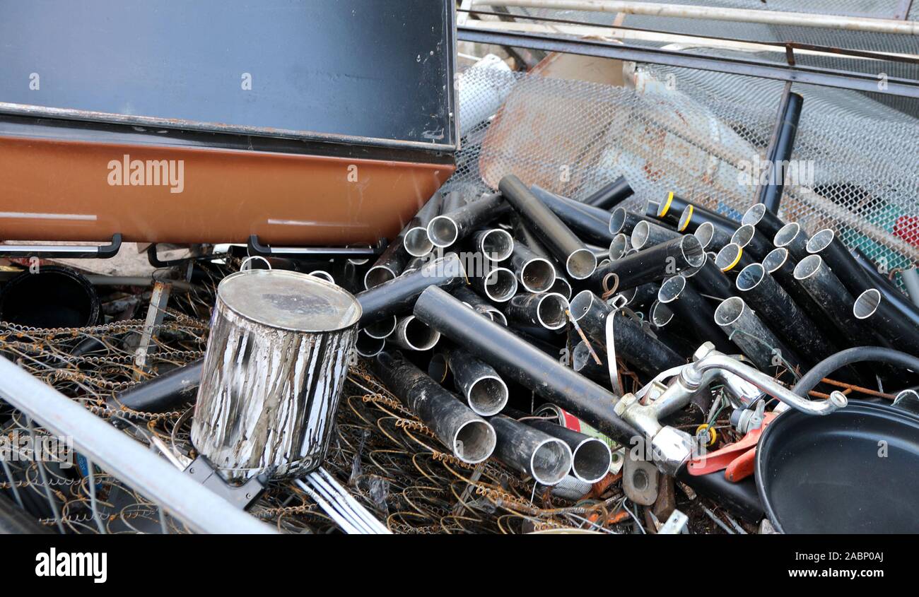 many iron scraps on the junk dealer and metal pipes Stock Photo Alamy