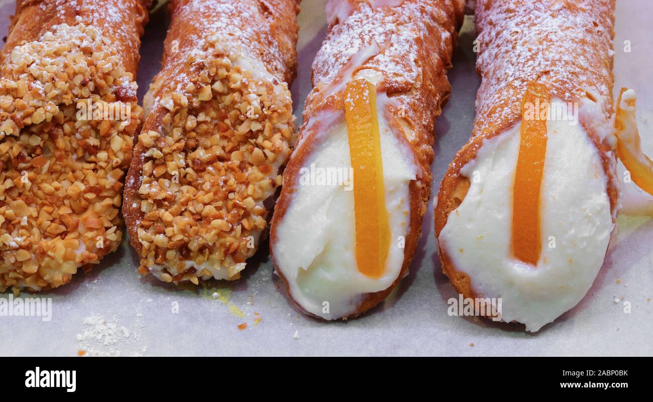 pastry item called Cannolo Siciliano in Italian patisserie Stock Photo