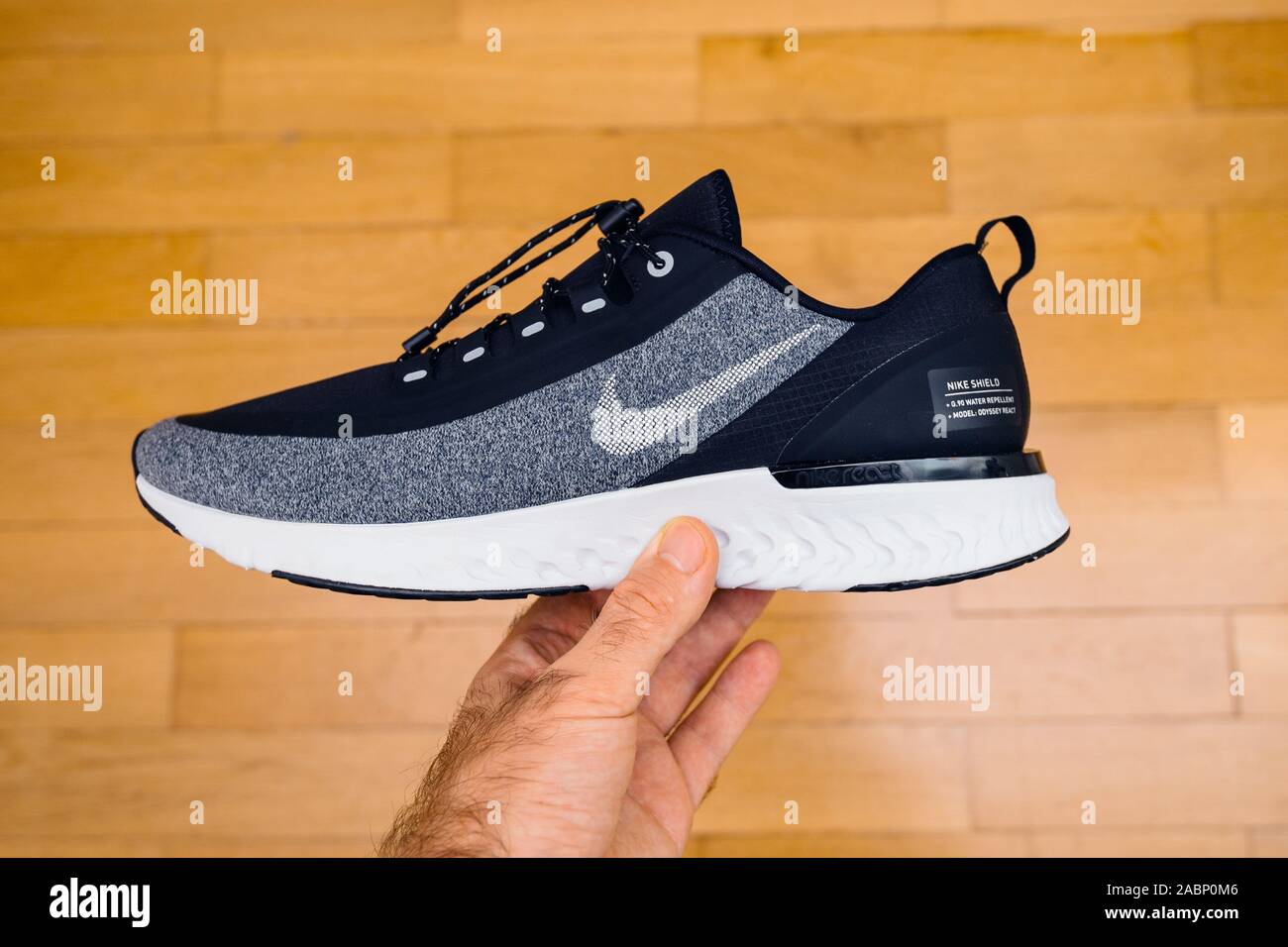 Paris, France - Oct 18, 2019: New edition of waterproof windproof running shoe Nike Odyssey React Shield 2 over wooden background Stock Photo - Alamy