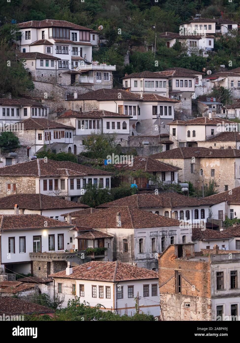 Berat, Albania - September 27, 2019: Ottoman houses with multiple windows built on a hillside in Berat, Albania. Stock Photo