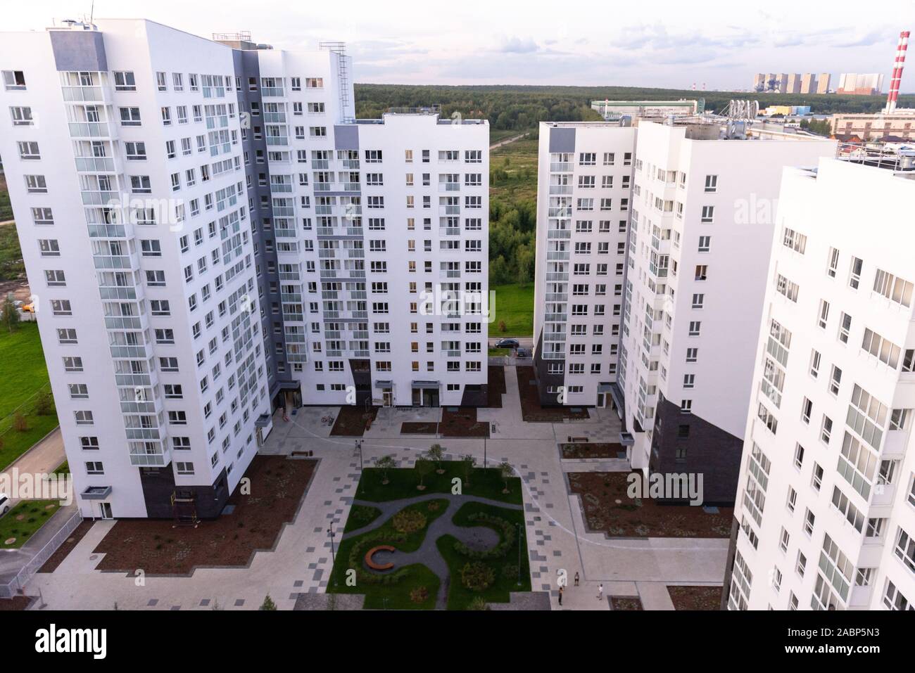 Residential buildings. Housing complex 'White Nights'. Landscaped yard with a playground. Stock Photo