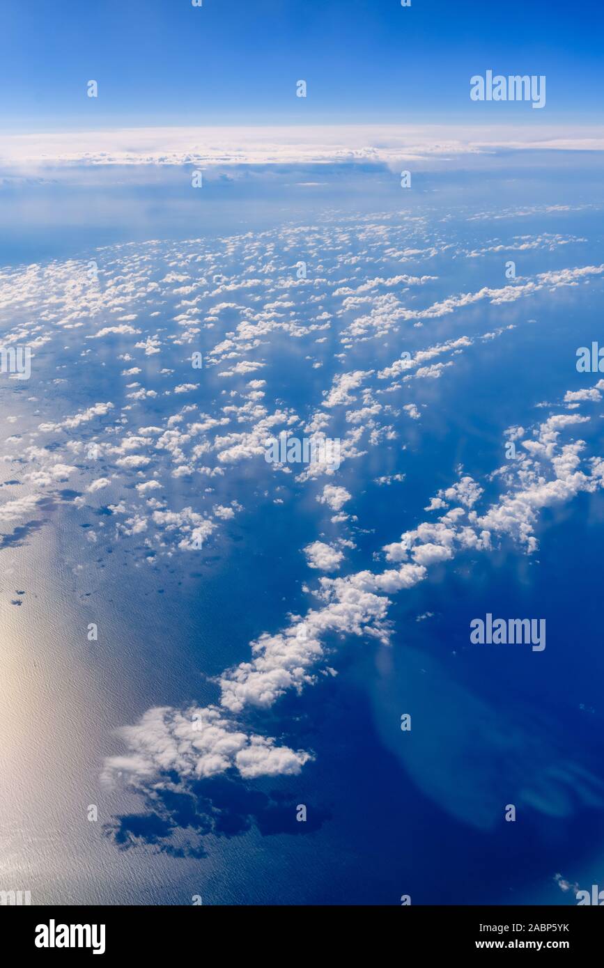 Sea of blue and white clouds seen from above Stock Photo - Alamy