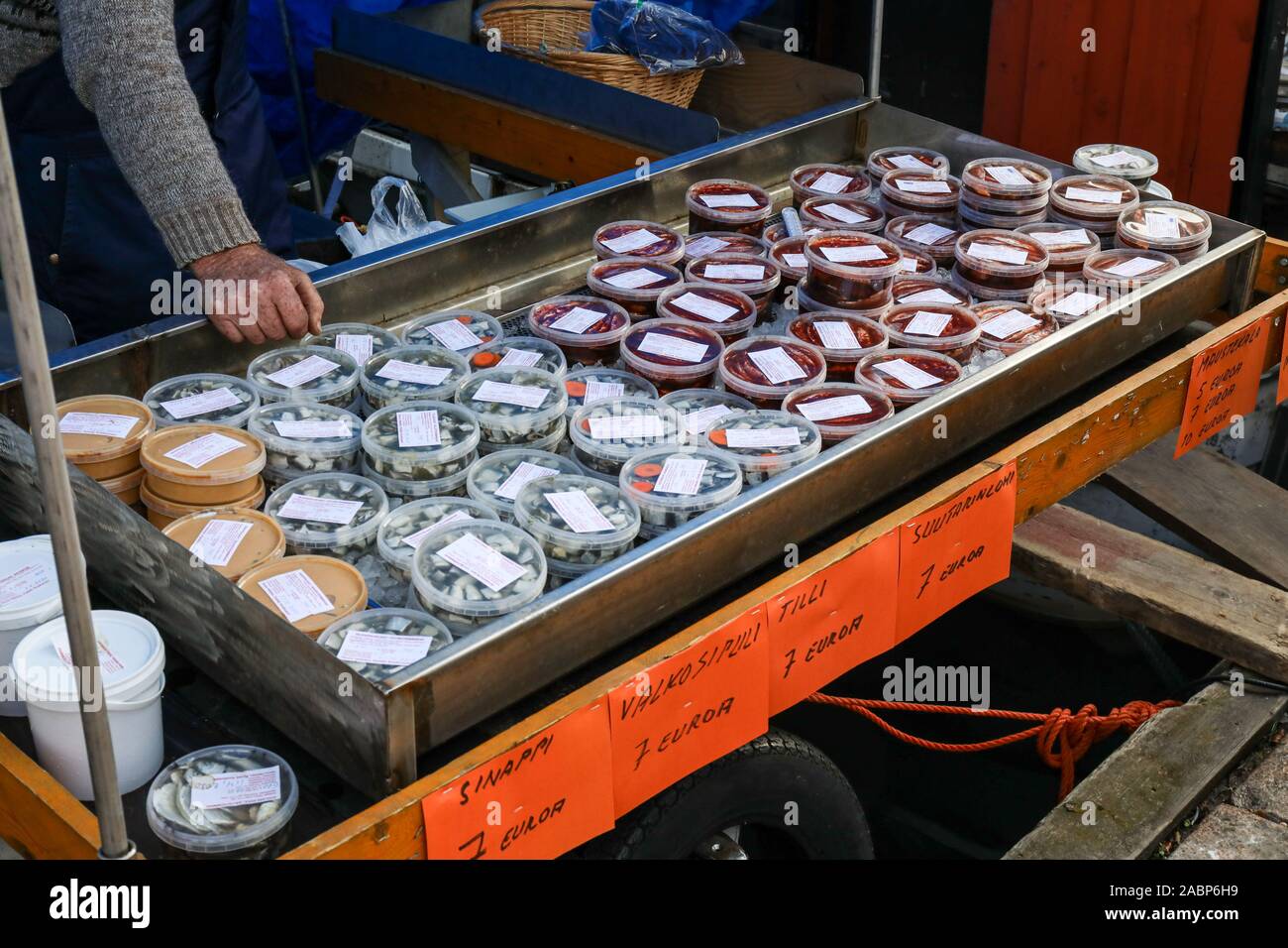 Herring products for sale at Baltic Herring Fair by Market Square in Helsinki, Finland Stock Photo