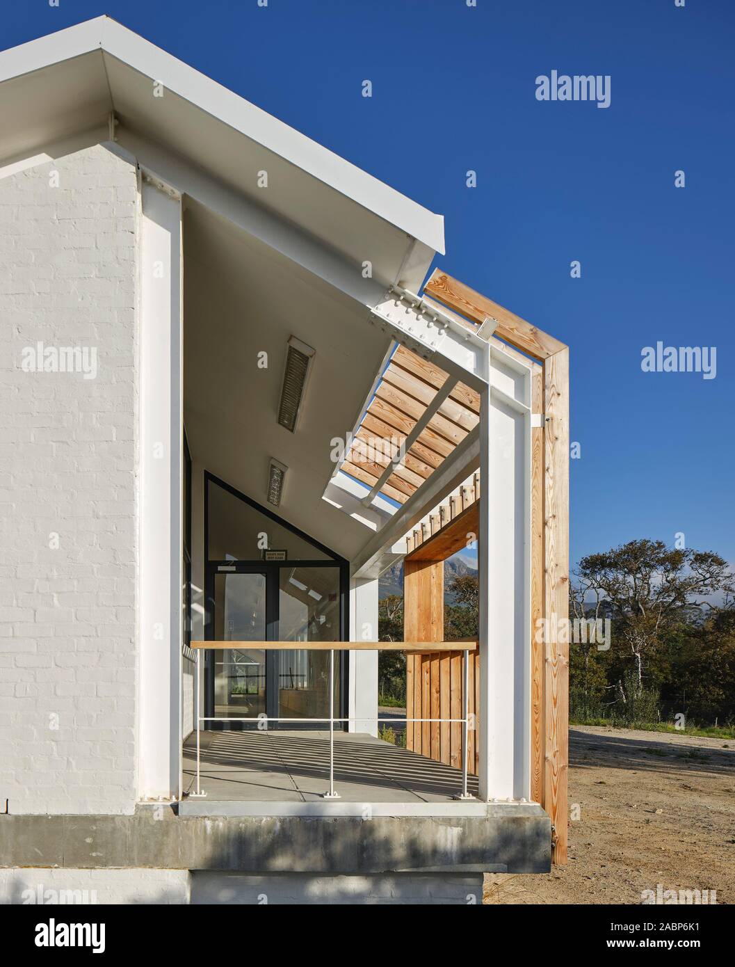 Side elevation with timber slat clad balcony. SAN Parks Tokai Offices