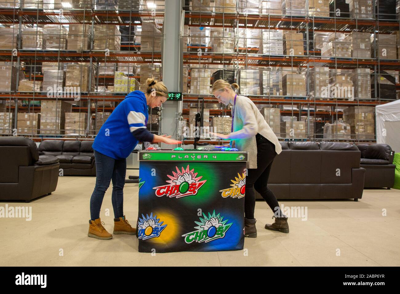 Picture dated November 27th shows staff relaxing during a break as they prepare for Black Friday at the Amazon  Peterborough fulfilment centre.    Amazon is expecting this to be the busiest Christmas on record as their week of Black Friday sales culminates tomorrow (Fri). Staff at its fulfilment centres in the UK are working around the clock to fulfil millions of orders after the online shopping centre slashed prices on thousands of must-have products. Amazon has been offering Black Friday deals since last Friday, with thousands of ÒDeals of the DayÓ and ÒLightning DealsÓ available with produc Stock Photo