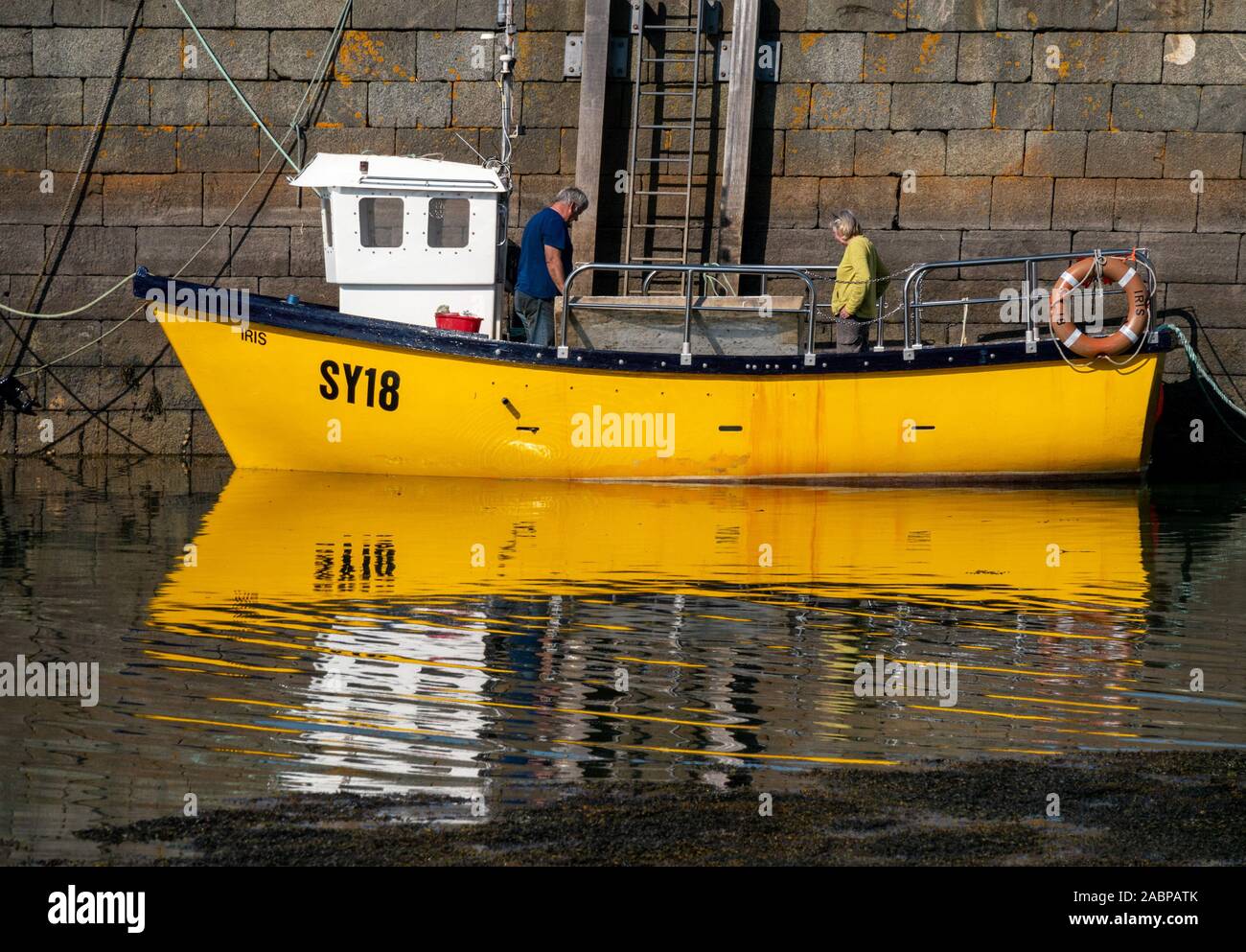 Download Yellow Fishing Boat High Resolution Stock Photography And Images Alamy PSD Mockup Templates
