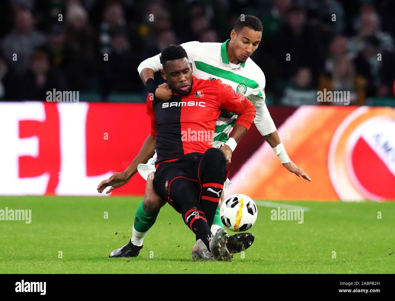 Celtic's Christopher Jullien (right) and Rennes' Jordan Siebatcheu battle for the ball during the UEFA Europa League Group E match at Celtic Park, Glasgow. Stock Photo