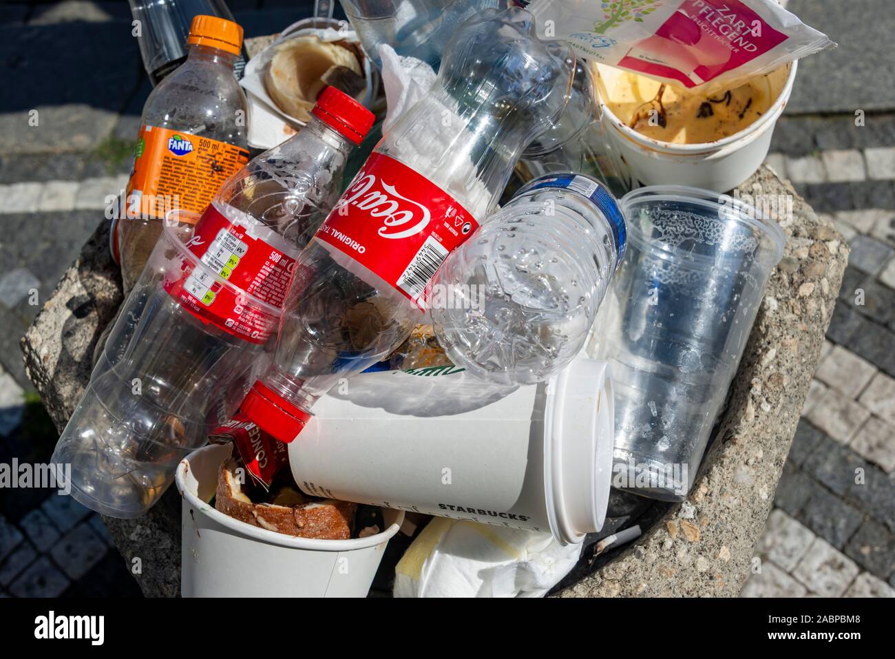Full rubbish bin with lots of plastic waste and empty plastic bottles, Prague, Czech Republic Stock Photo