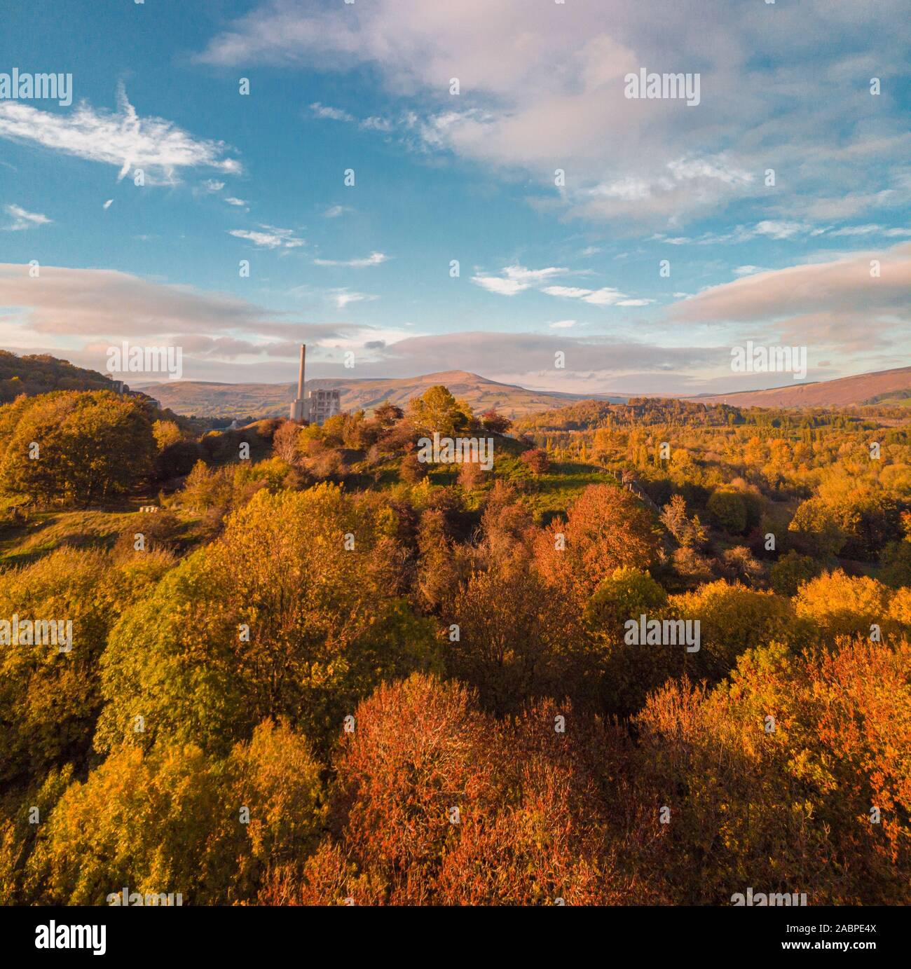 Drone aerial shot of treetops in the Peak District national Park in Autumn Fall Stock Photo