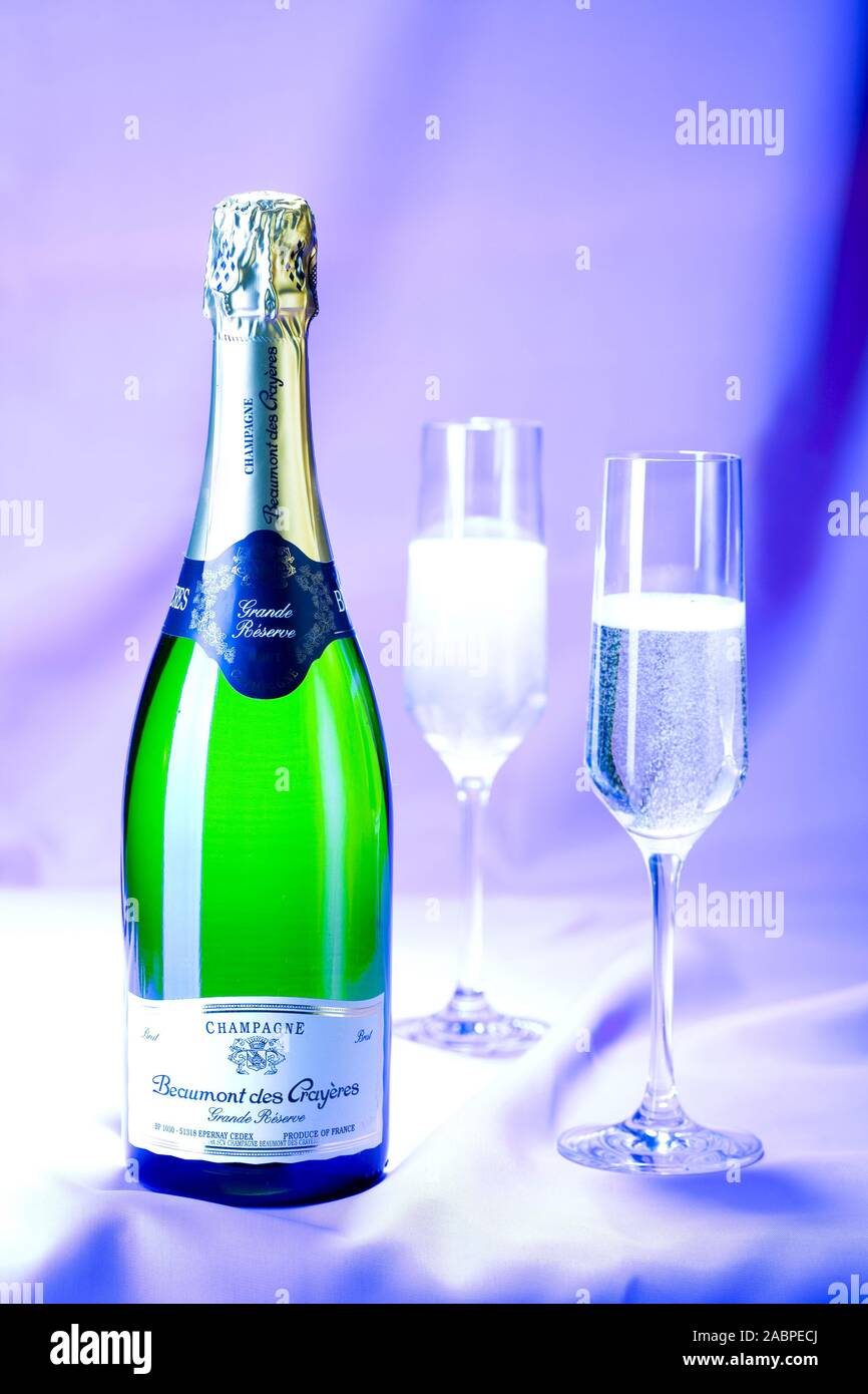 Champagnerflasche mit zwei befuellten Glaesern Stock Photo