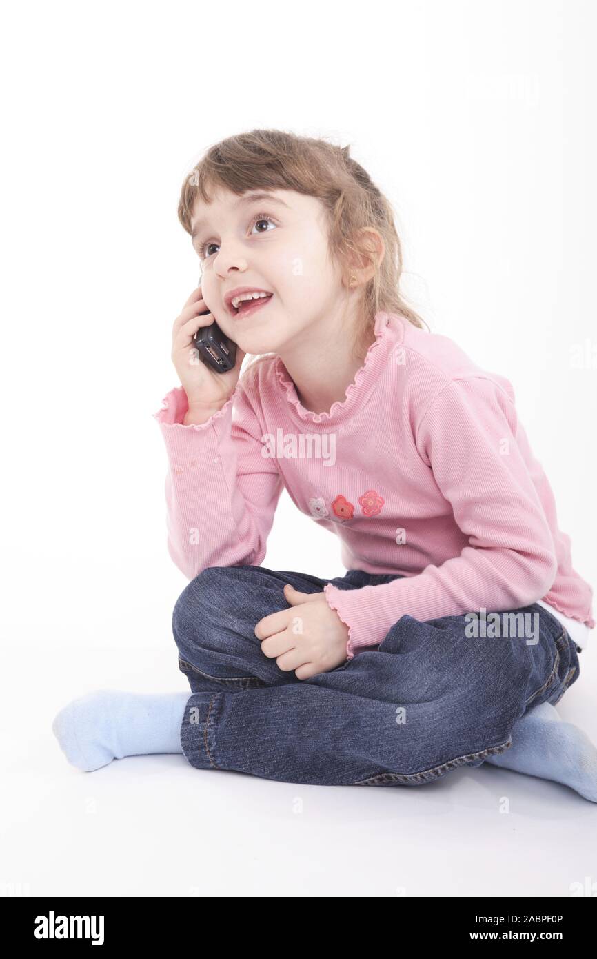 Kind beim telefonieren Stock Photo