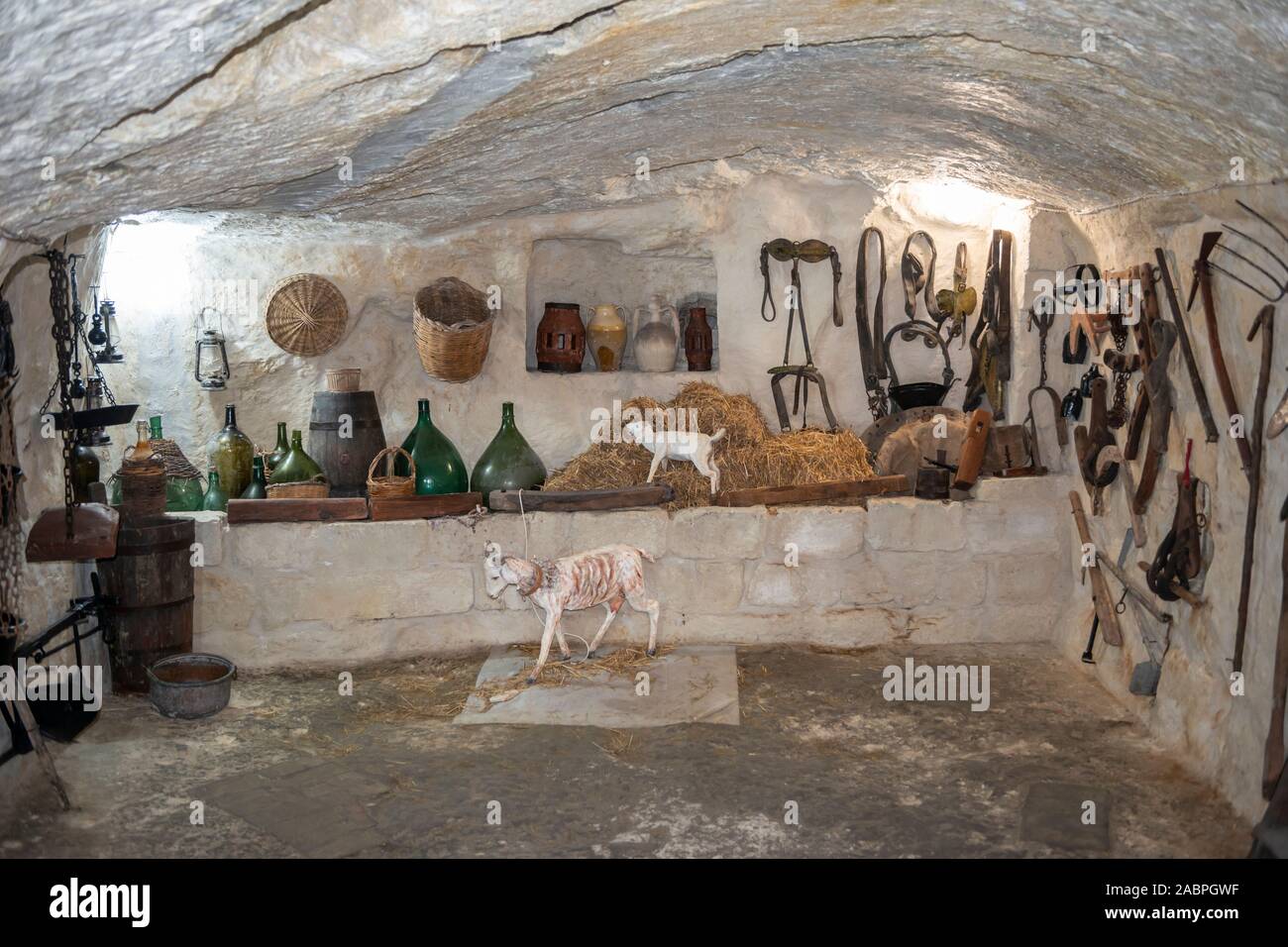 Casa Grotta del Barisano, a cave-house reconstruction, on Via Tre Corone in Sassi District of Matera, Basilicata Region, Southern Italy Stock Photo