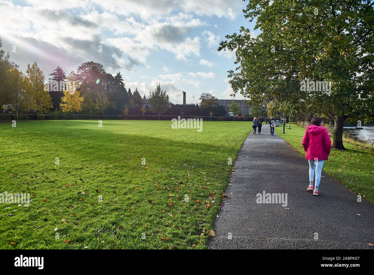 People walking on riverside path pathway hi-res stock photography and ...
