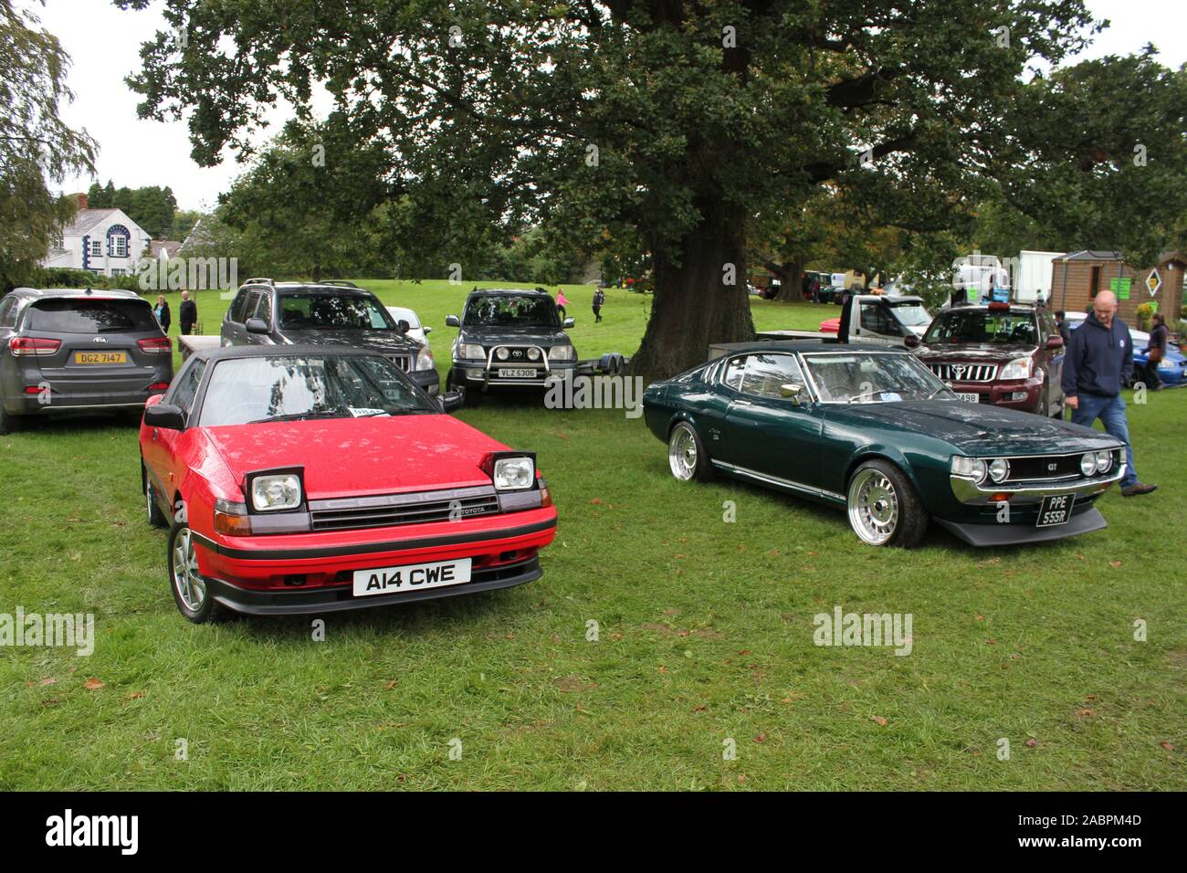 Red 1987 Toyota Celica GT and a green 1977 Toyota Celica Lift Back seen at Kilbroney VIntage Show 2019 Stock Photo