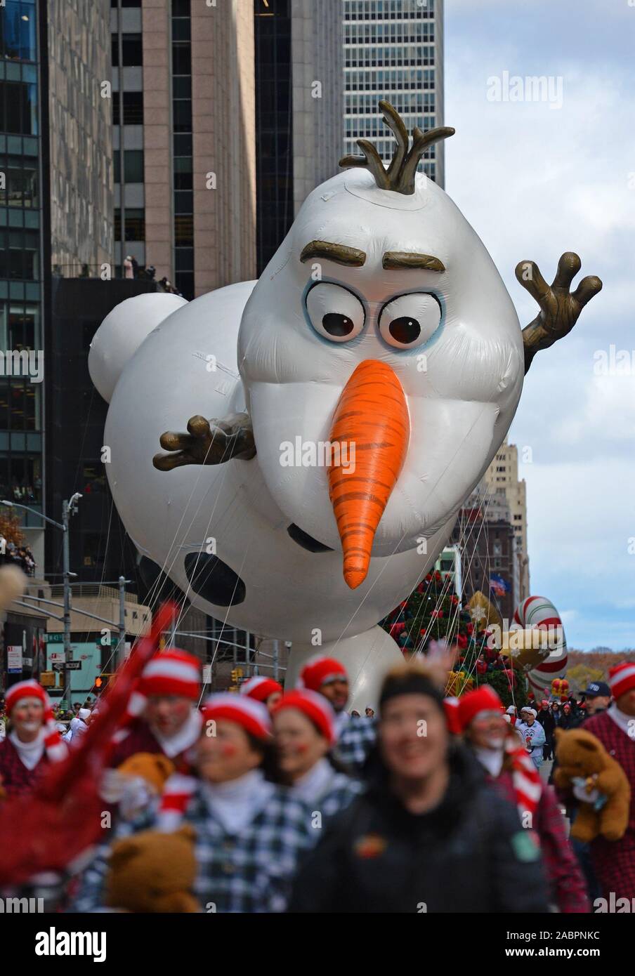 New York, USA. 28th Nov, 2019. The balloon of Olaf from Disney's Frozen is seen during the 2019 Macy's Thanksgiving Day Parade in New York, the United States, on Nov. 28, 2019. Credit: Li Rui/Xinhua/Alamy Live News Stock Photo