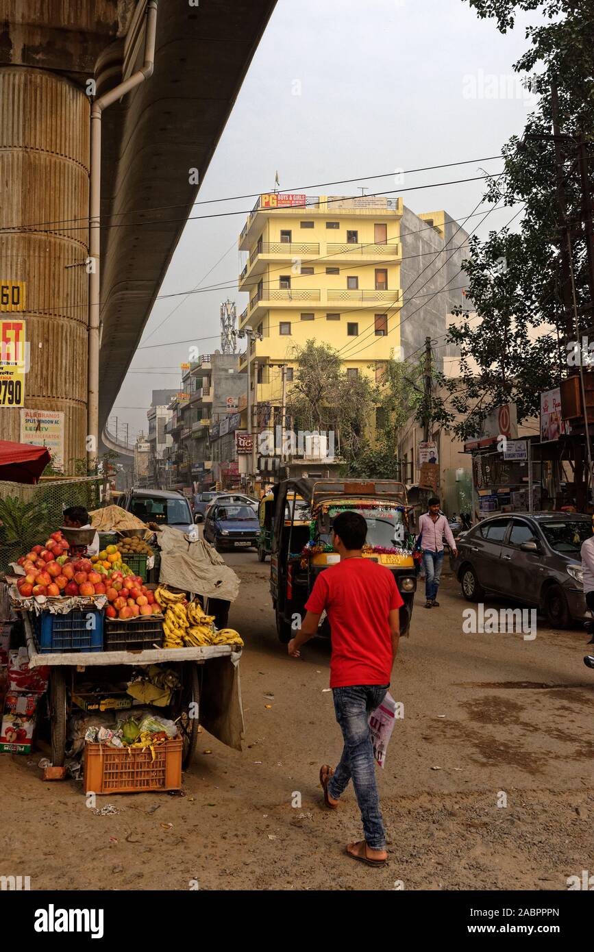 Sikandarpur village, mainly under and alongside the Delhi rapid metro railway, Gurgaon, India Stock Photo
