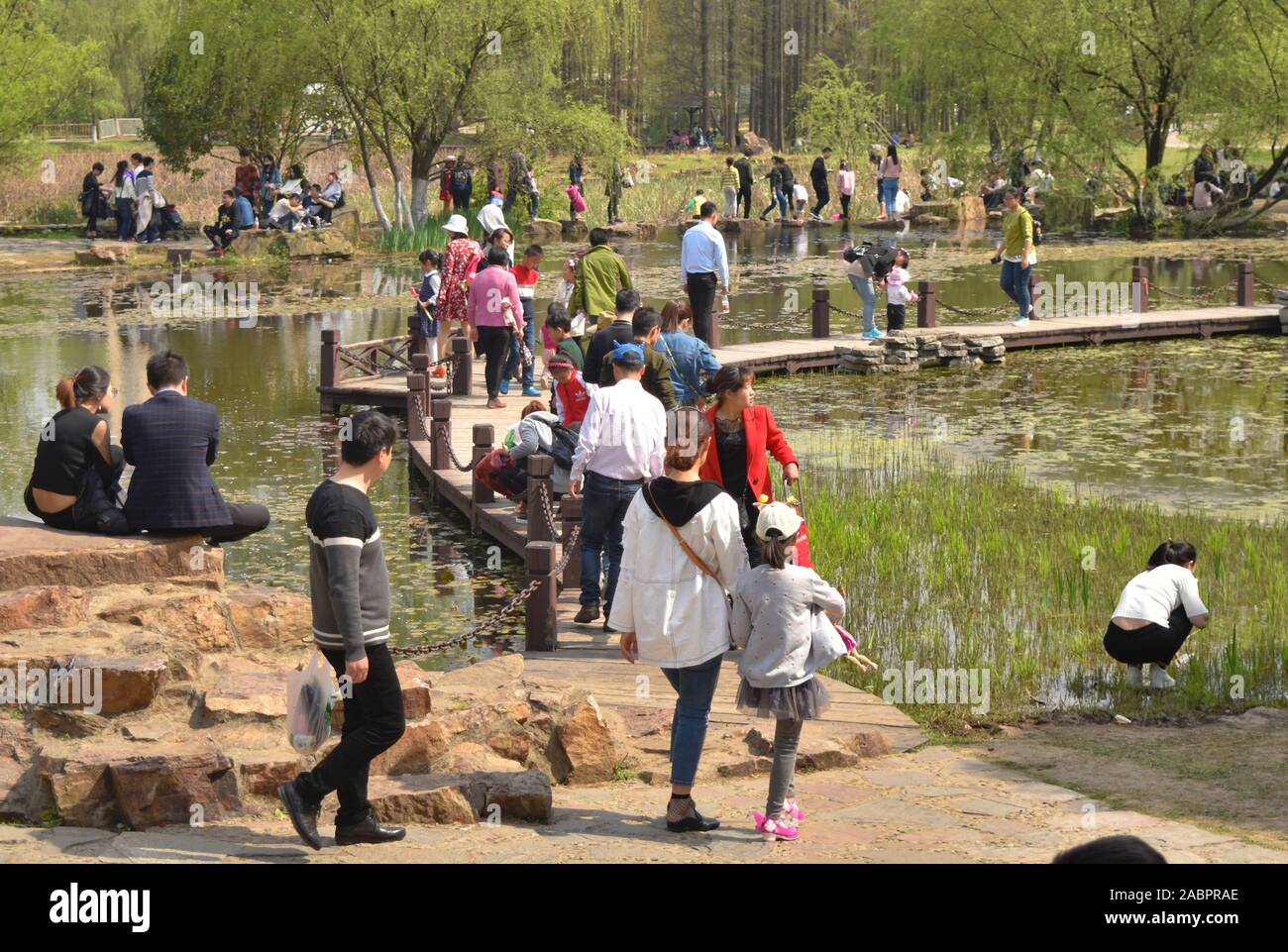 Family leisure time at Chinese garden, Hefei,  China Stock Photo