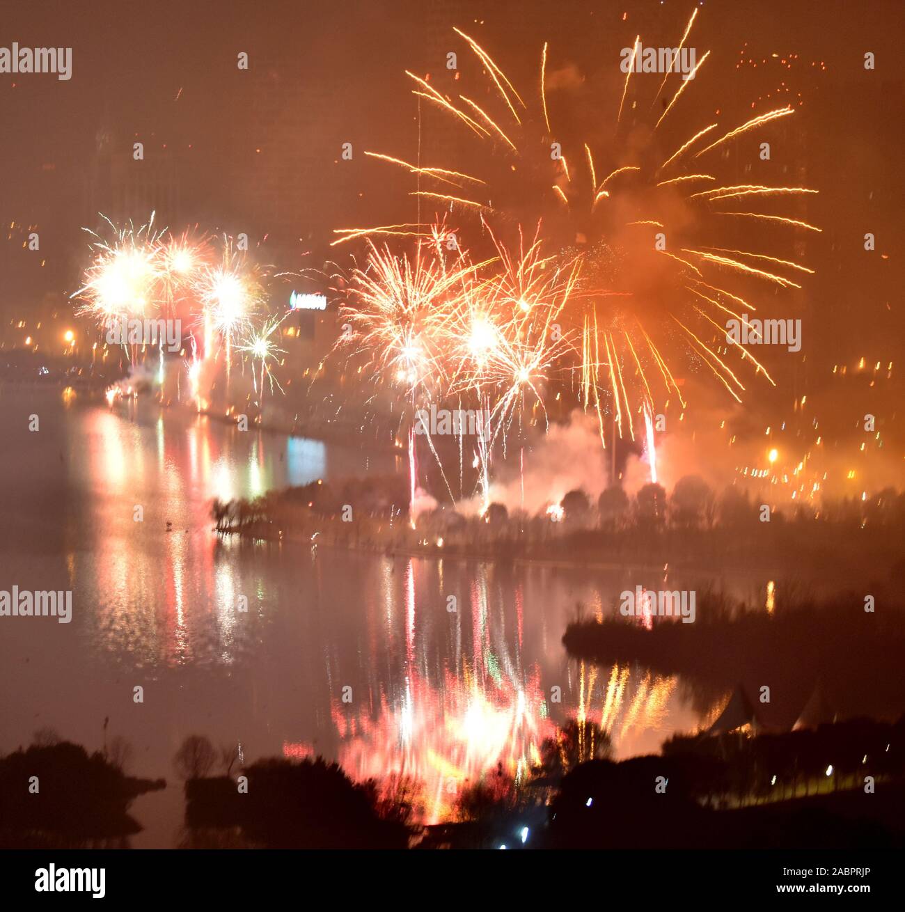 New year fireworks by Swan lake, Hefei, China Stock Photo