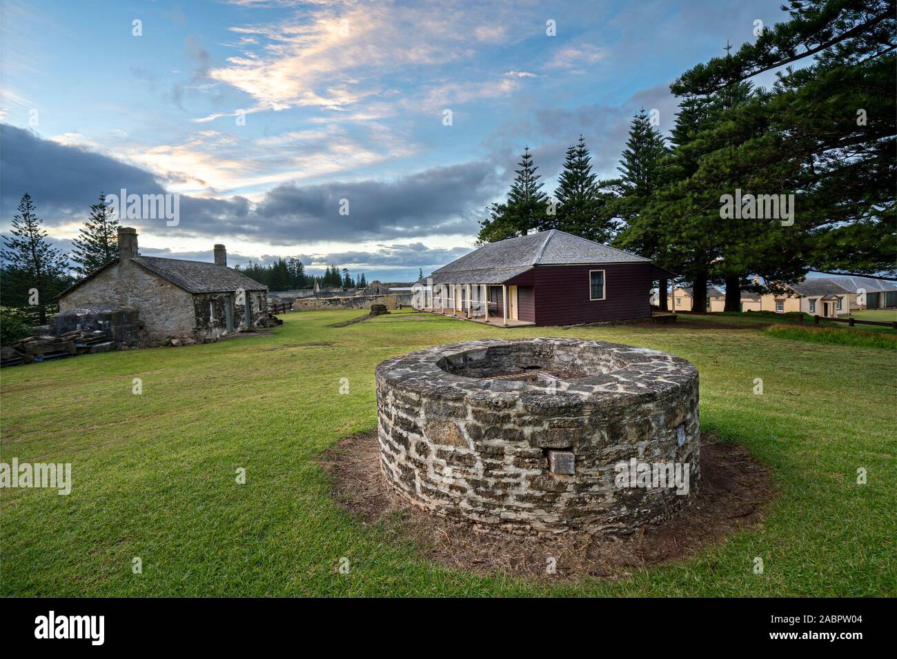 Kingston and Arthur’s Vale Historic Area with the Surgeon’s House (1928) in the background beyond the well. Norfolk Island, Australia Stock Photo