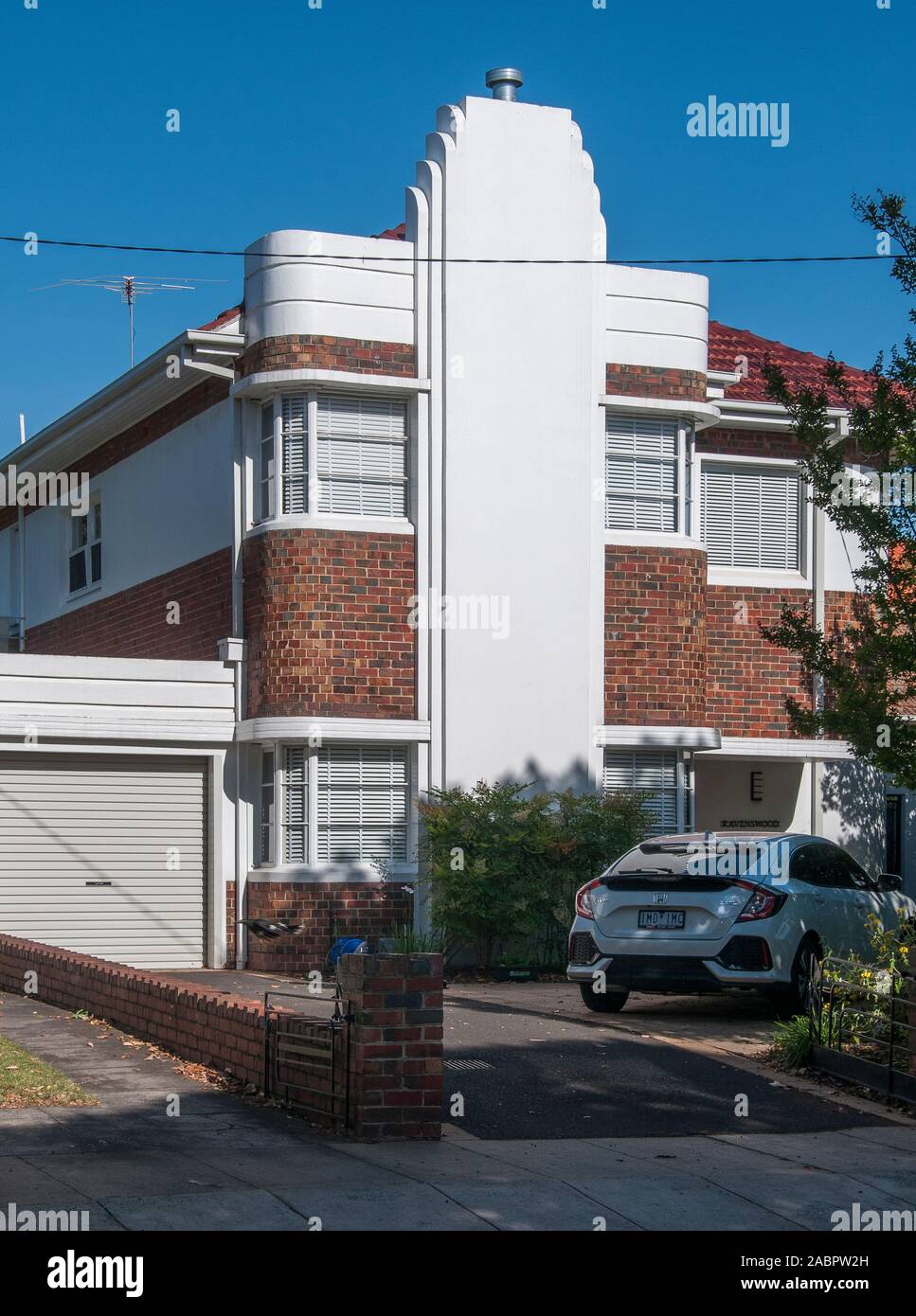 One of a pair of late interwar pair of Streamline Moderne dwellings, 1938-1940, in mirrored configuration, Elsternwick, Melbourne, Australia Stock Photo