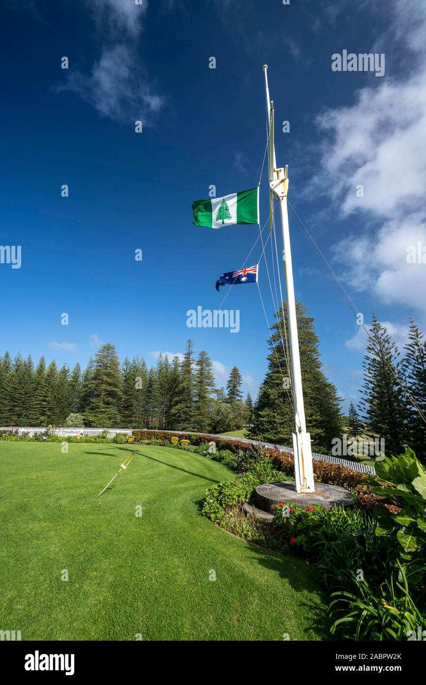 Norfolk Island and Australian flags flying at Government House in Kingston and Arthur’s Vale Historic Area. The precinct is one of the eleven sites ma Stock Photo