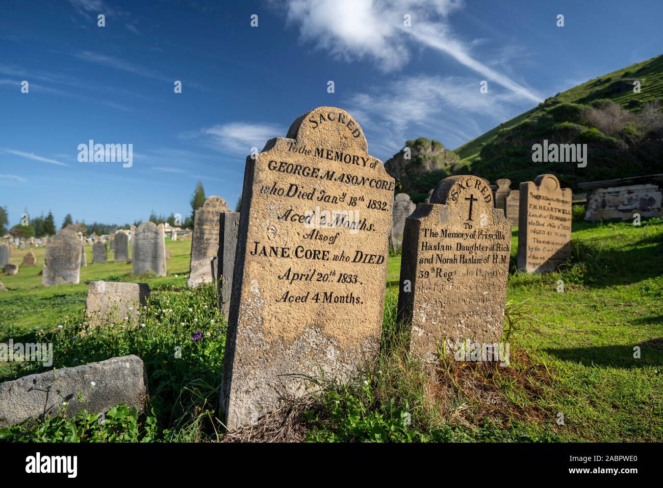 Headstones in Cemetery Reserve in Kingston and Arthur’s Vale. The cemetery has been in use since about 1798 and the gravestones bear witness to convic Stock Photo